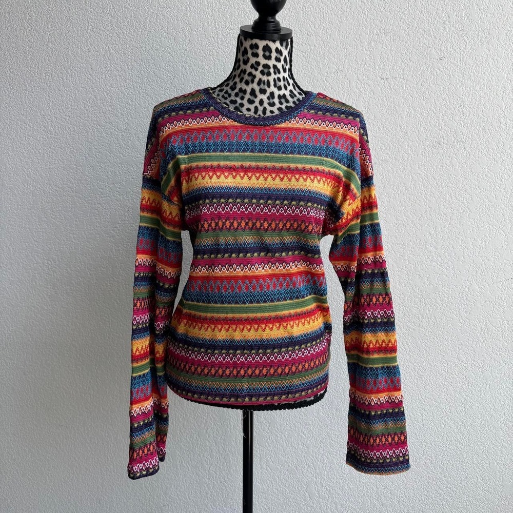 Multicolored knit long sleeve top.